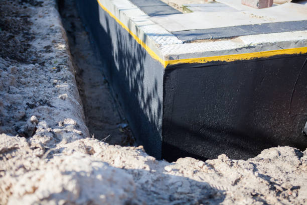 Professional Emergency Waterproofing technician working in Fair Oaks, IN
